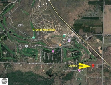 Fantastic location just across from Crystal Mountain Resort with on Crystal Mountain Golf Course in Michigan - for sale on GolfHomes.com, golf home, golf lot