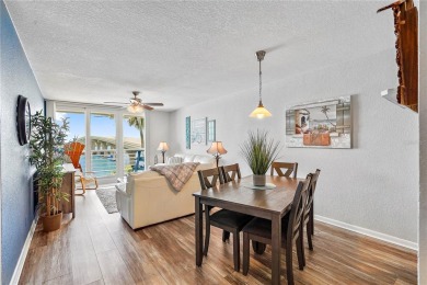 This exquisite penthouse offers stunning views of the on Isla Del Sol Yacht and Country Club in Florida - for sale on GolfHomes.com, golf home, golf lot