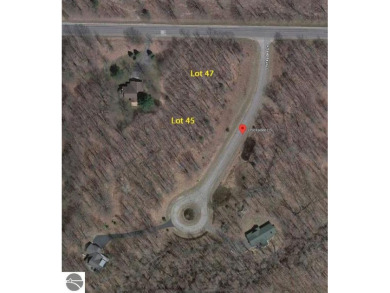 Fantastic location just across from Crystal Mountain Resort with on Crystal Mountain Golf Course in Michigan - for sale on GolfHomes.com, golf home, golf lot