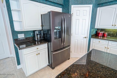 Pride of ownership shines throughout this immaculate well on Plantation Bay Golf and Country Club in Florida - for sale on GolfHomes.com, golf home, golf lot