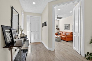 GORGEOUS CONDO WITH DESIREABLE WEST EXPOSURE , BEAUTIFULLY on Boca West Golf and Country Club in Florida - for sale on GolfHomes.com, golf home, golf lot