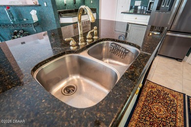 Pride of ownership shines throughout this immaculate well on Plantation Bay Golf and Country Club in Florida - for sale on GolfHomes.com, golf home, golf lot