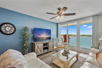 This exquisite penthouse offers stunning views of the on Isla Del Sol Yacht and Country Club in Florida - for sale on GolfHomes.com, golf home, golf lot