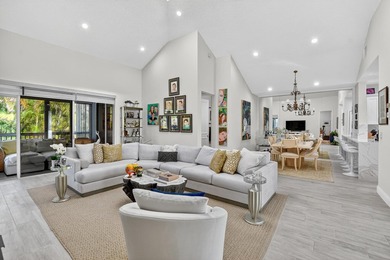 GORGEOUS CONDO WITH DESIREABLE WEST EXPOSURE , BEAUTIFULLY on Boca West Golf and Country Club in Florida - for sale on GolfHomes.com, golf home, golf lot