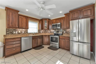 Welcome to 2831 Corinthia Cir, an IMMACULATE and SPACIOUS home on Herons Glen Golf and Country Club in Florida - for sale on GolfHomes.com, golf home, golf lot