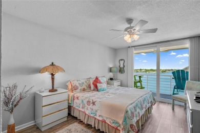 This exquisite penthouse offers stunning views of the on Isla Del Sol Yacht and Country Club in Florida - for sale on GolfHomes.com, golf home, golf lot