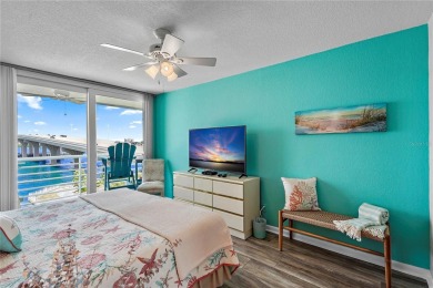 This exquisite penthouse offers stunning views of the on Isla Del Sol Yacht and Country Club in Florida - for sale on GolfHomes.com, golf home, golf lot