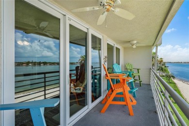 This exquisite penthouse offers stunning views of the on Isla Del Sol Yacht and Country Club in Florida - for sale on GolfHomes.com, golf home, golf lot