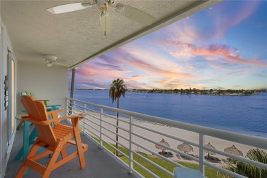 This exquisite penthouse offers stunning views of the on Isla Del Sol Yacht and Country Club in Florida - for sale on GolfHomes.com, golf home, golf lot