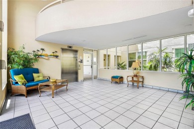 This exquisite penthouse offers stunning views of the on Isla Del Sol Yacht and Country Club in Florida - for sale on GolfHomes.com, golf home, golf lot