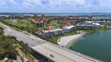 This exquisite penthouse offers stunning views of the on Isla Del Sol Yacht and Country Club in Florida - for sale on GolfHomes.com, golf home, golf lot
