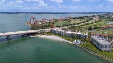 This exquisite penthouse offers stunning views of the on Isla Del Sol Yacht and Country Club in Florida - for sale on GolfHomes.com, golf home, golf lot