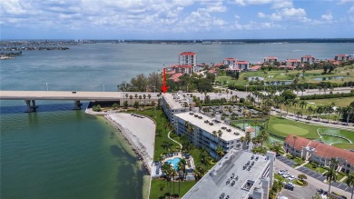 This exquisite penthouse offers stunning views of the on Isla Del Sol Yacht and Country Club in Florida - for sale on GolfHomes.com, golf home, golf lot