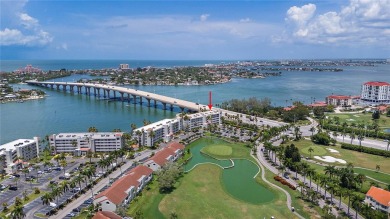 This exquisite penthouse offers stunning views of the on Isla Del Sol Yacht and Country Club in Florida - for sale on GolfHomes.com, golf home, golf lot