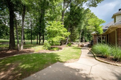 This stunning custom home on the prestigious Founder's Course of on Chenal Country Club - Bear Den Mountain in Arkansas - for sale on GolfHomes.com, golf home, golf lot