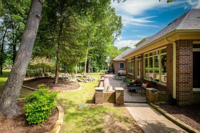 This stunning custom home on the prestigious Founder's Course of on Chenal Country Club - Bear Den Mountain in Arkansas - for sale on GolfHomes.com, golf home, golf lot