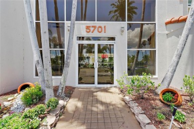 This exquisite penthouse offers stunning views of the on Isla Del Sol Yacht and Country Club in Florida - for sale on GolfHomes.com, golf home, golf lot