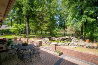 This stunning custom home on the prestigious Founder's Course of on Chenal Country Club - Bear Den Mountain in Arkansas - for sale on GolfHomes.com, golf home, golf lot