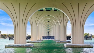 This exquisite penthouse offers stunning views of the on Isla Del Sol Yacht and Country Club in Florida - for sale on GolfHomes.com, golf home, golf lot