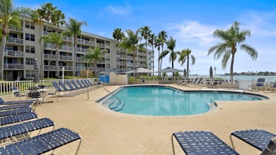 This exquisite penthouse offers stunning views of the on Isla Del Sol Yacht and Country Club in Florida - for sale on GolfHomes.com, golf home, golf lot
