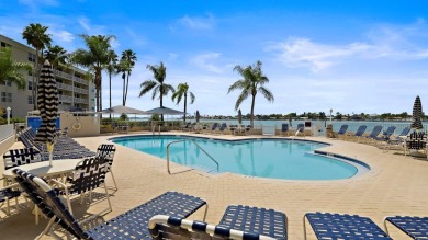 This exquisite penthouse offers stunning views of the on Isla Del Sol Yacht and Country Club in Florida - for sale on GolfHomes.com, golf home, golf lot