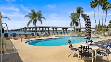 This exquisite penthouse offers stunning views of the on Isla Del Sol Yacht and Country Club in Florida - for sale on GolfHomes.com, golf home, golf lot