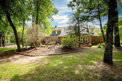 This stunning custom home on the prestigious Founder's Course of on Chenal Country Club - Bear Den Mountain in Arkansas - for sale on GolfHomes.com, golf home, golf lot