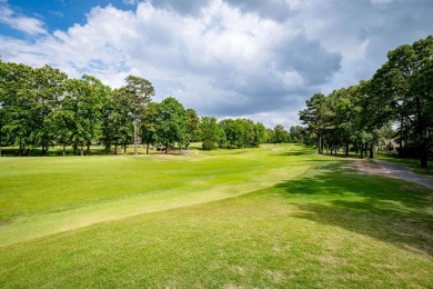 This stunning custom home on the prestigious Founder's Course of on Chenal Country Club - Bear Den Mountain in Arkansas - for sale on GolfHomes.com, golf home, golf lot