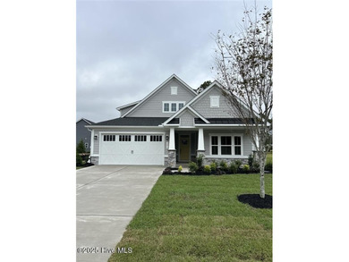 QUICK MOVE IN!! Welcome to Resort Style Living a golf cart ride on Sea Trail Golf Resort in North Carolina - for sale on GolfHomes.com, golf home, golf lot