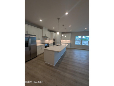 QUICK MOVE IN!! Welcome to Resort Style Living a golf cart ride on Sea Trail Golf Resort in North Carolina - for sale on GolfHomes.com, golf home, golf lot