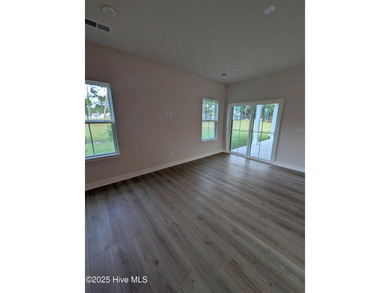 QUICK MOVE IN!! Welcome to Resort Style Living a golf cart ride on Sea Trail Golf Resort in North Carolina - for sale on GolfHomes.com, golf home, golf lot