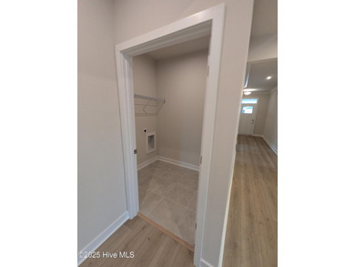 QUICK MOVE IN!! Welcome to Resort Style Living a golf cart ride on Sea Trail Golf Resort in North Carolina - for sale on GolfHomes.com, golf home, golf lot