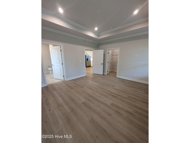 QUICK MOVE IN!! Welcome to Resort Style Living a golf cart ride on Sea Trail Golf Resort in North Carolina - for sale on GolfHomes.com, golf home, golf lot