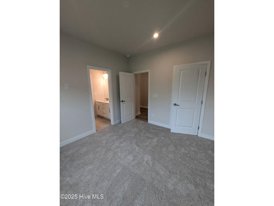 QUICK MOVE IN!! Welcome to Resort Style Living a golf cart ride on Sea Trail Golf Resort in North Carolina - for sale on GolfHomes.com, golf home, golf lot