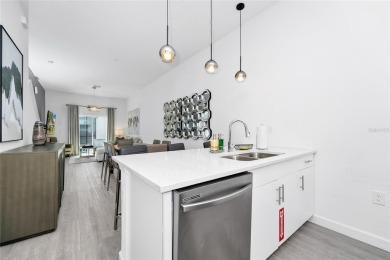 This beautifully designed 4-bedroom, 4-bathroom townhouse plus a on Reunion Resort Golf Course in Florida - for sale on GolfHomes.com, golf home, golf lot