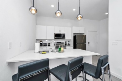This beautifully designed 4-bedroom, 4-bathroom townhouse plus a on Reunion Resort Golf Course in Florida - for sale on GolfHomes.com, golf home, golf lot