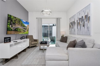 This beautifully designed 4-bedroom, 4-bathroom townhouse plus a on Reunion Resort Golf Course in Florida - for sale on GolfHomes.com, golf home, golf lot