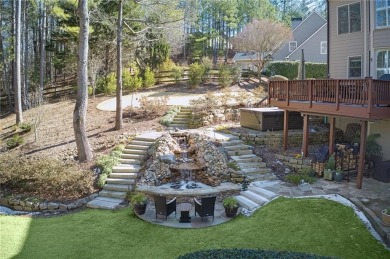 This Exceptional Home in the Prestigious Woodmont Golf & Country on Woodmont Golf and Country Club in Georgia - for sale on GolfHomes.com, golf home, golf lot