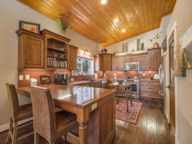 Nestled on an expansive 1.9-acre lot surrounded by whispering on Angel Fire Resort Country Club in New Mexico - for sale on GolfHomes.com, golf home, golf lot