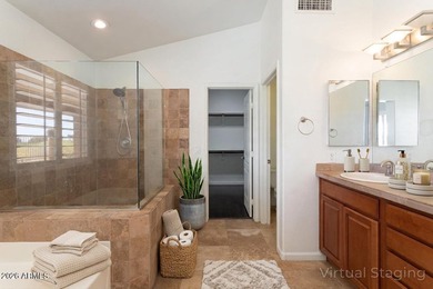 Beautiful single level home situated on a lush golf course lot on The Foothills Golf Club in Arizona - for sale on GolfHomes.com, golf home, golf lot