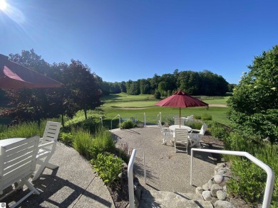 Surround yourself among nature and endless recreation on Manitou Passage Golf Club in Michigan - for sale on GolfHomes.com, golf home, golf lot