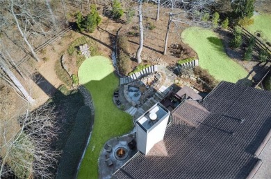 This Exceptional Home in the Prestigious Woodmont Golf & Country on Woodmont Golf and Country Club in Georgia - for sale on GolfHomes.com, golf home, golf lot