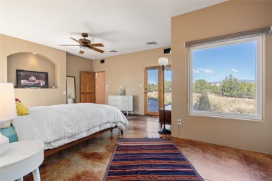 Views! This beautiful home, perched on the highest hill in on Pueblo de Cochiti Golf Course in New Mexico - for sale on GolfHomes.com, golf home, golf lot