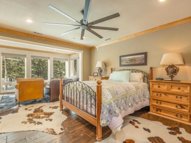 Nestled on an expansive 1.9-acre lot surrounded by whispering on Angel Fire Resort Country Club in New Mexico - for sale on GolfHomes.com, golf home, golf lot