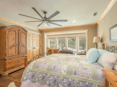 Nestled on an expansive 1.9-acre lot surrounded by whispering on Angel Fire Resort Country Club in New Mexico - for sale on GolfHomes.com, golf home, golf lot