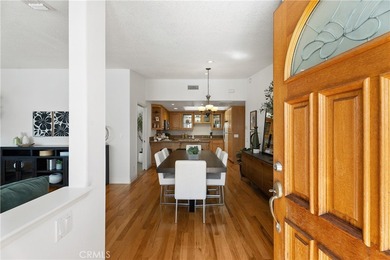 Beautiful fully expanded corner unit overlooking a small on Leisure World Seal Beach Golf Course in California - for sale on GolfHomes.com, golf home, golf lot