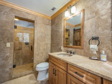 Nestled on an expansive 1.9-acre lot surrounded by whispering on Angel Fire Resort Country Club in New Mexico - for sale on GolfHomes.com, golf home, golf lot