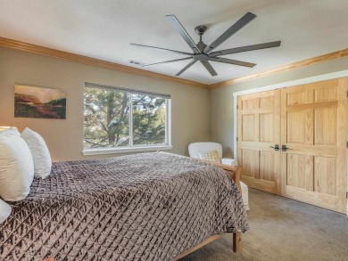 Nestled on an expansive 1.9-acre lot surrounded by whispering on Angel Fire Resort Country Club in New Mexico - for sale on GolfHomes.com, golf home, golf lot