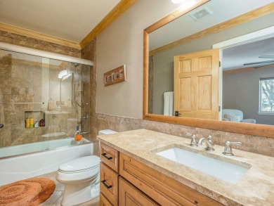 Nestled on an expansive 1.9-acre lot surrounded by whispering on Angel Fire Resort Country Club in New Mexico - for sale on GolfHomes.com, golf home, golf lot