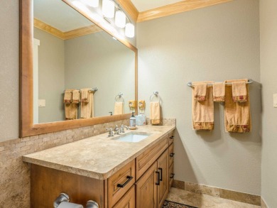 Nestled on an expansive 1.9-acre lot surrounded by whispering on Angel Fire Resort Country Club in New Mexico - for sale on GolfHomes.com, golf home, golf lot